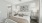 PRIMARY BEDROOM WITH WOOD PLANK-STYLE FLOORING AND CEILING FAN