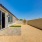 PRIVATE ENCLOSED BACKYARD WITH GREEN TURF LAWN