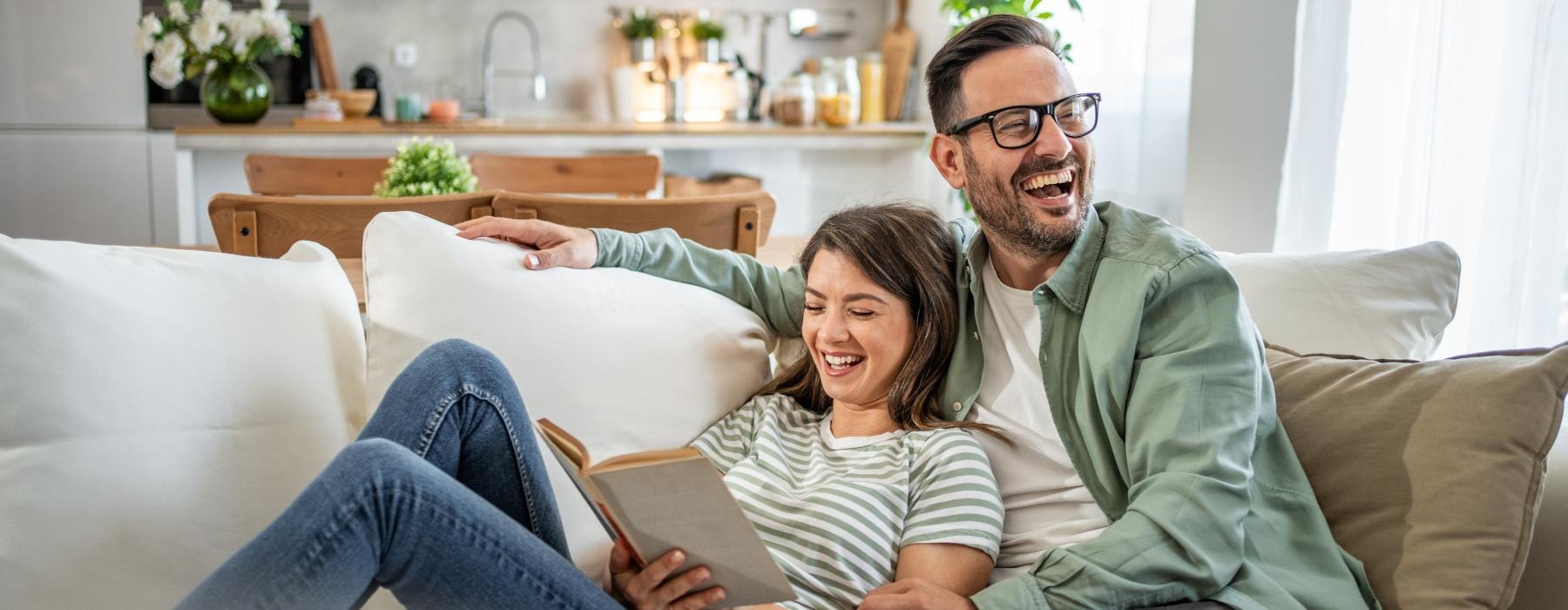 a man and a woman sitting on a couch