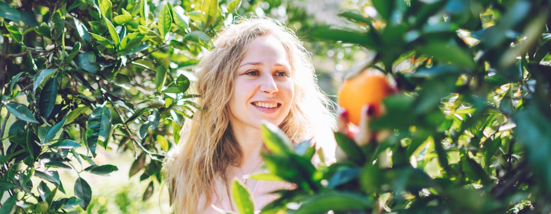 a person standing in front of a tree